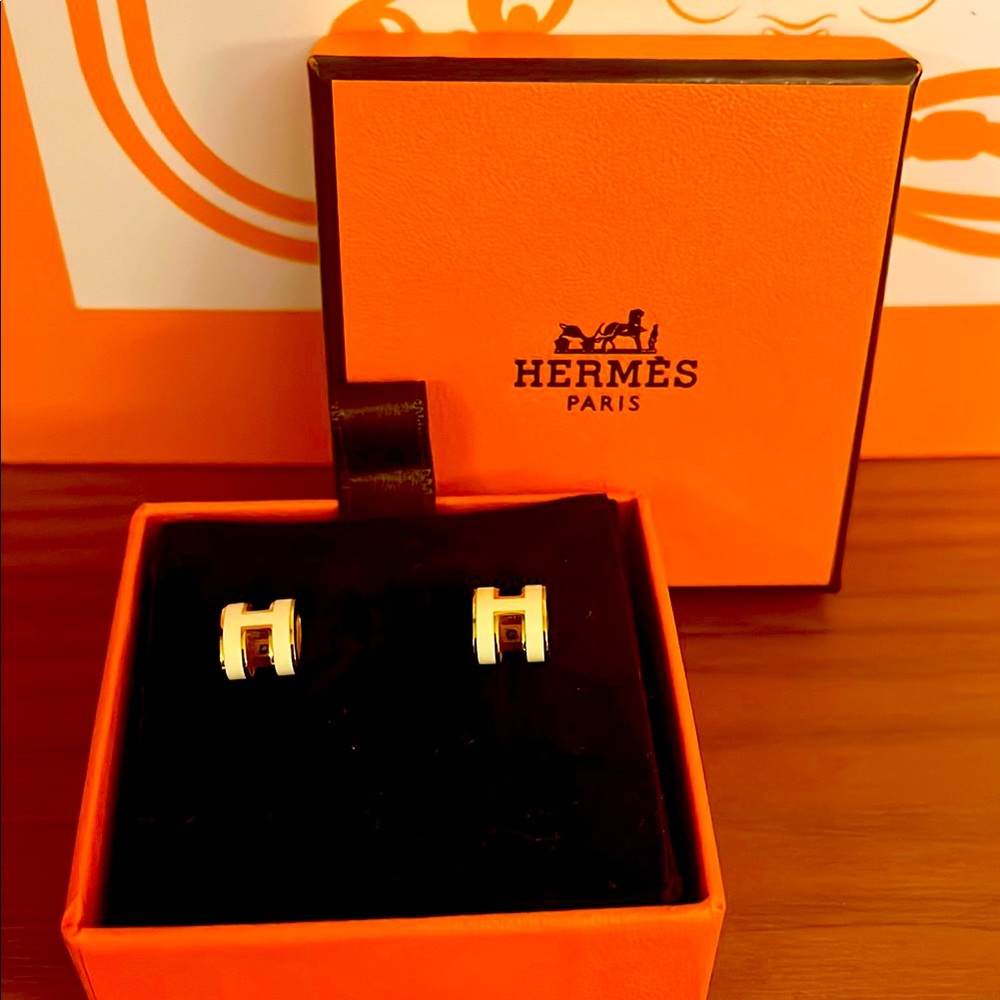 Original Hermes “H” white & gold studs.